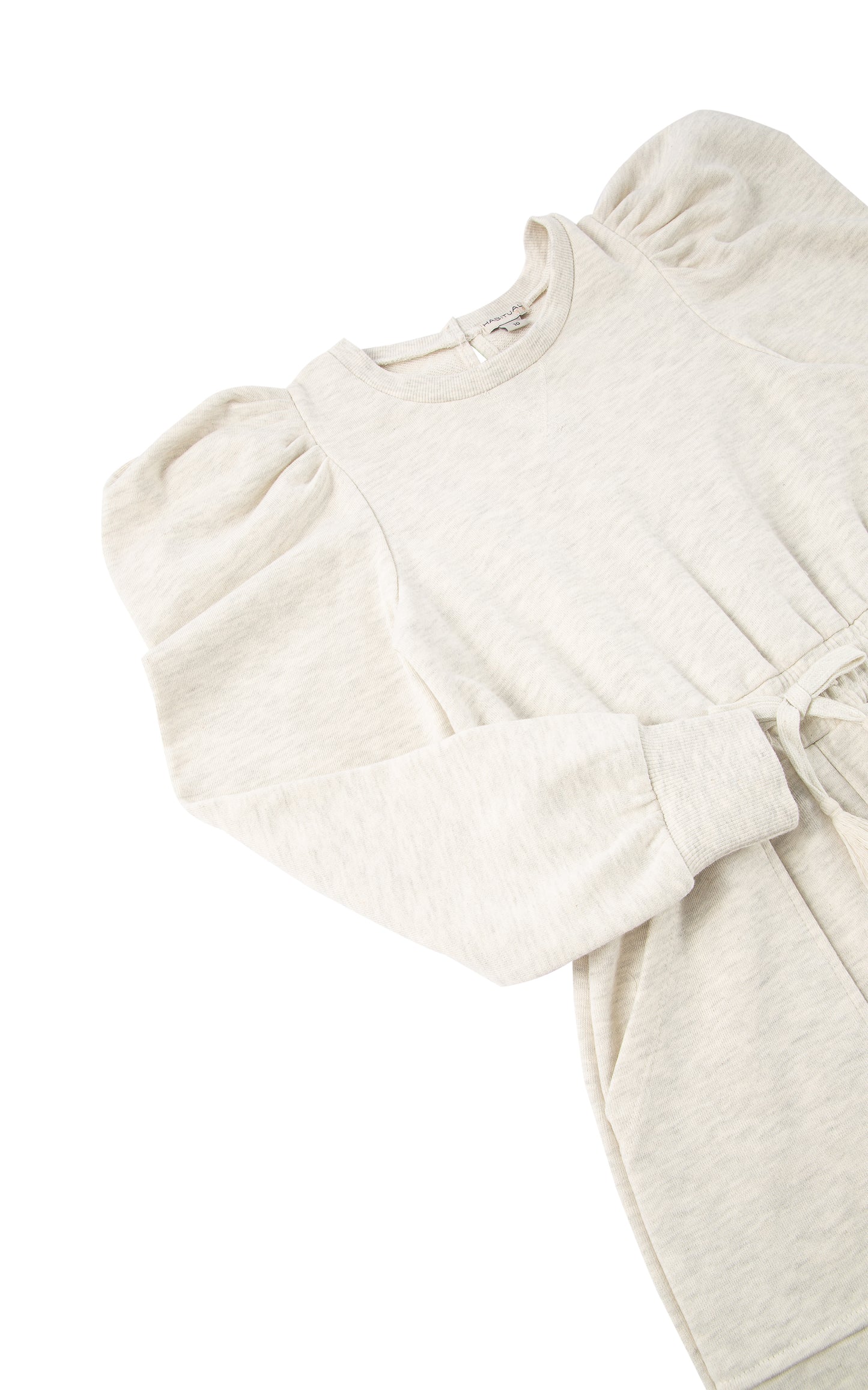Detail view of a grey French Terry jumpsuit with puff sleeves