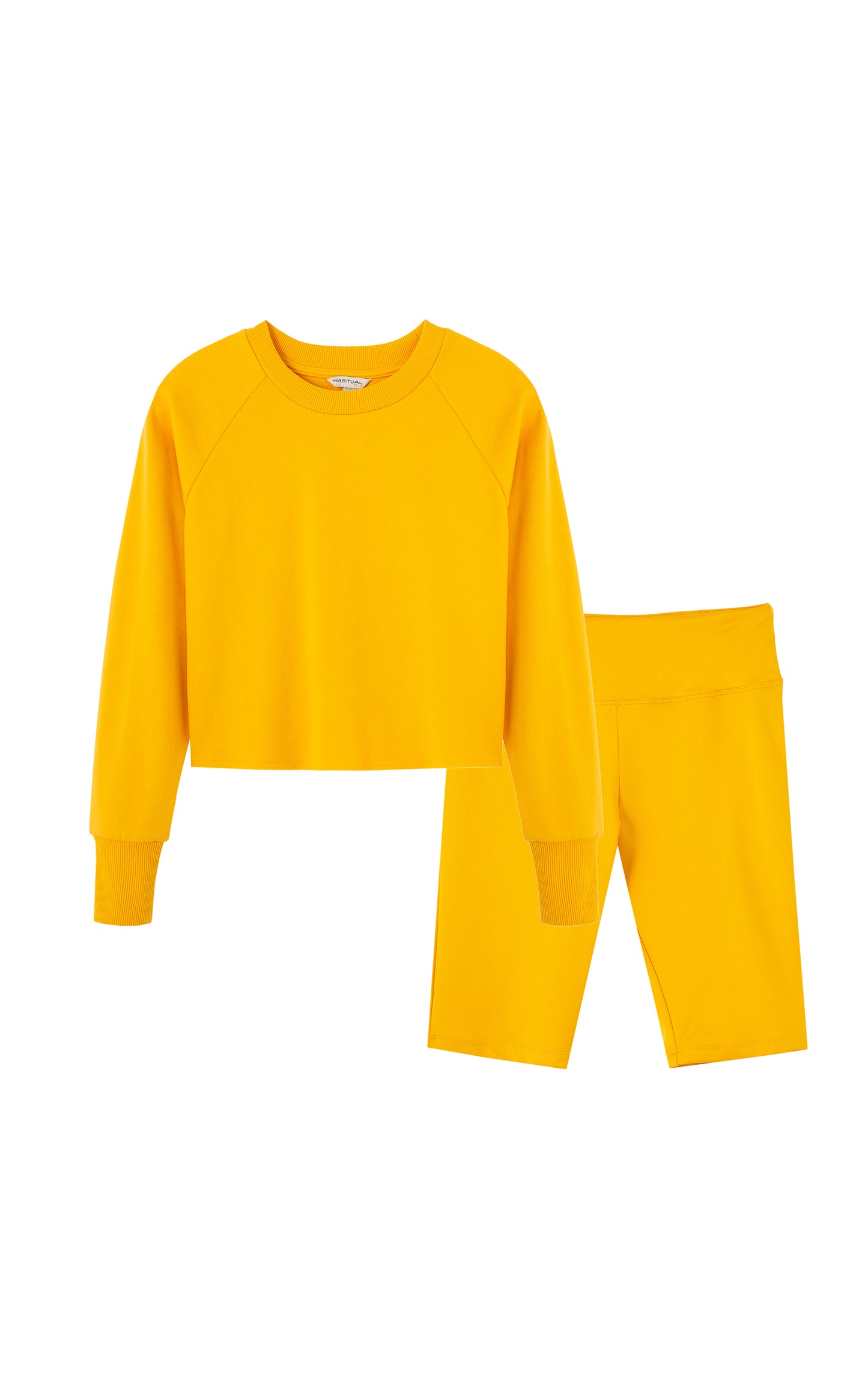 Yellow long-sleeve, crewneck top with matching shorts.