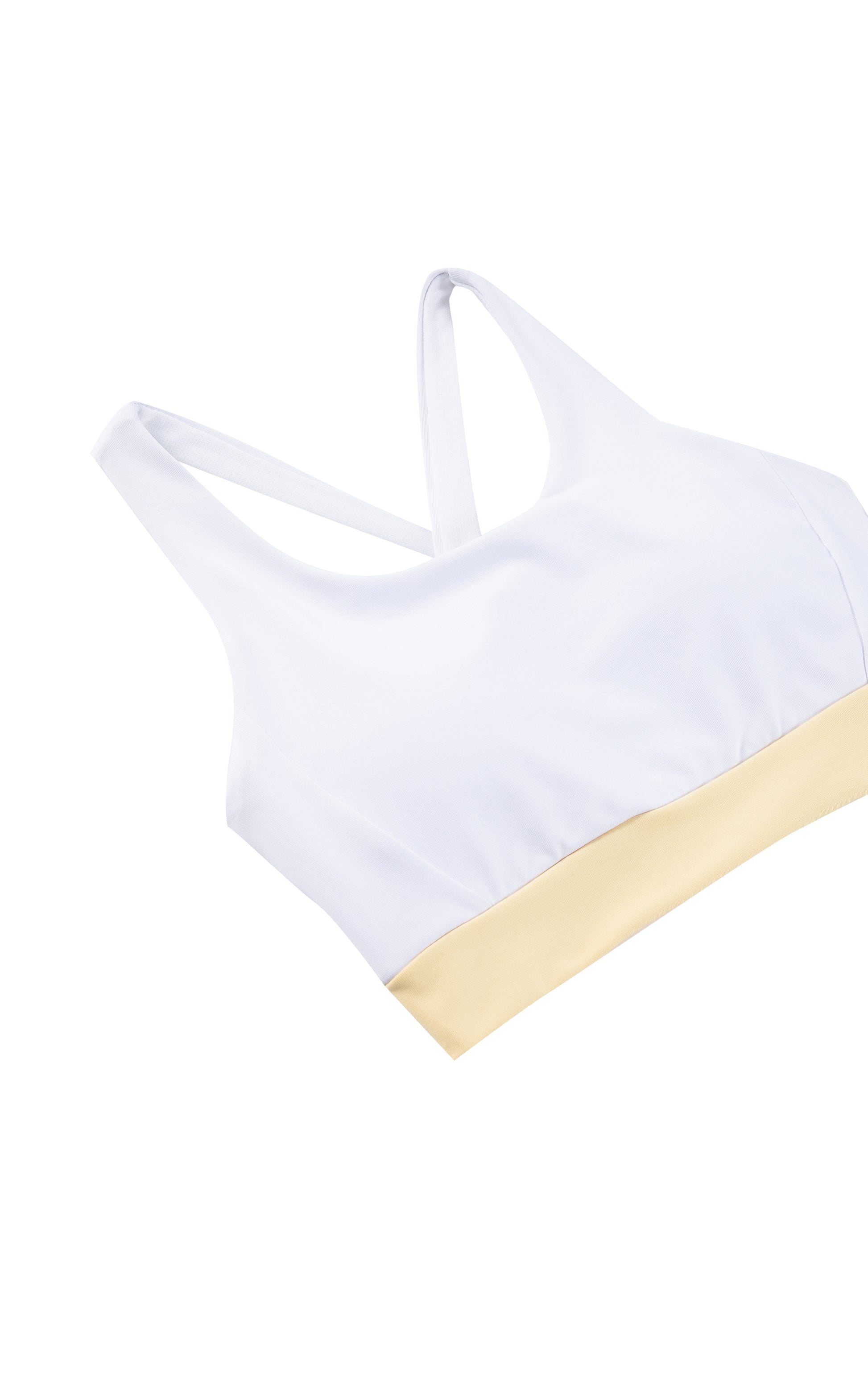 Close up of white tank top with yellow bottom trim