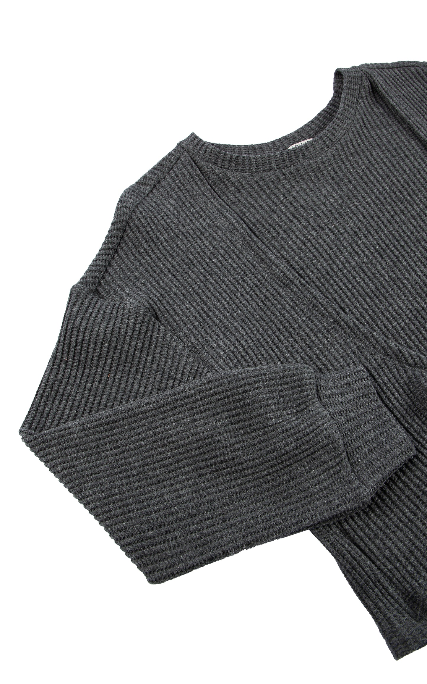 CLOSE UP OF DARK GREY  WAFFLE KNIT SWEATER WITH KNOT TWIST IN FRONT 