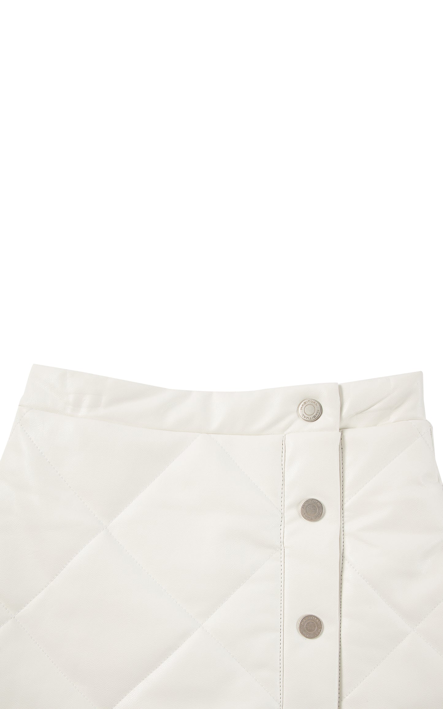 Detail view of an off-white quilted faux leather skirt with snaps