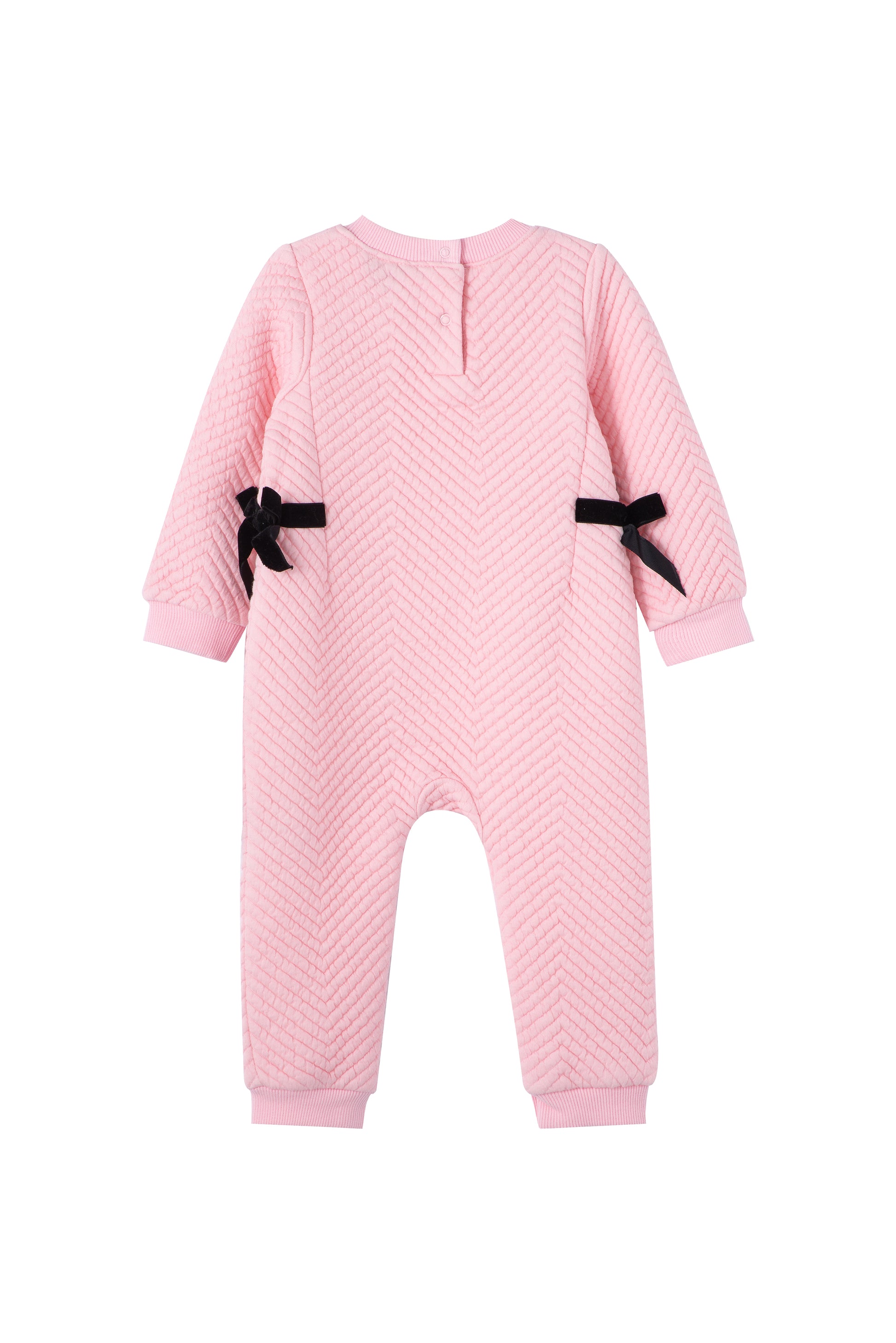 Back view of pink quilted jumpsuit with black side bows 
