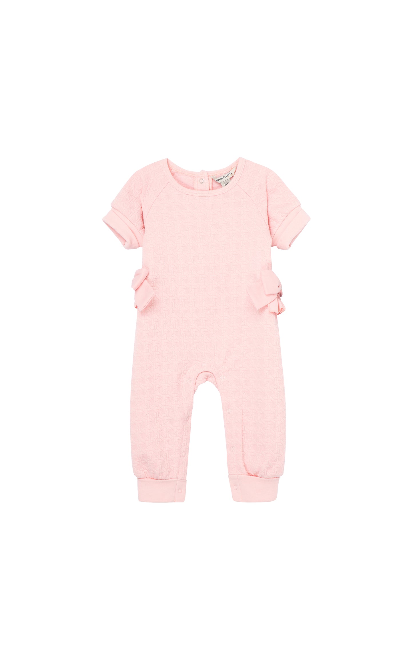 Pink double knit coverall with cuffed short sleeves, cuffed ankles, and medium-sized bows on rides