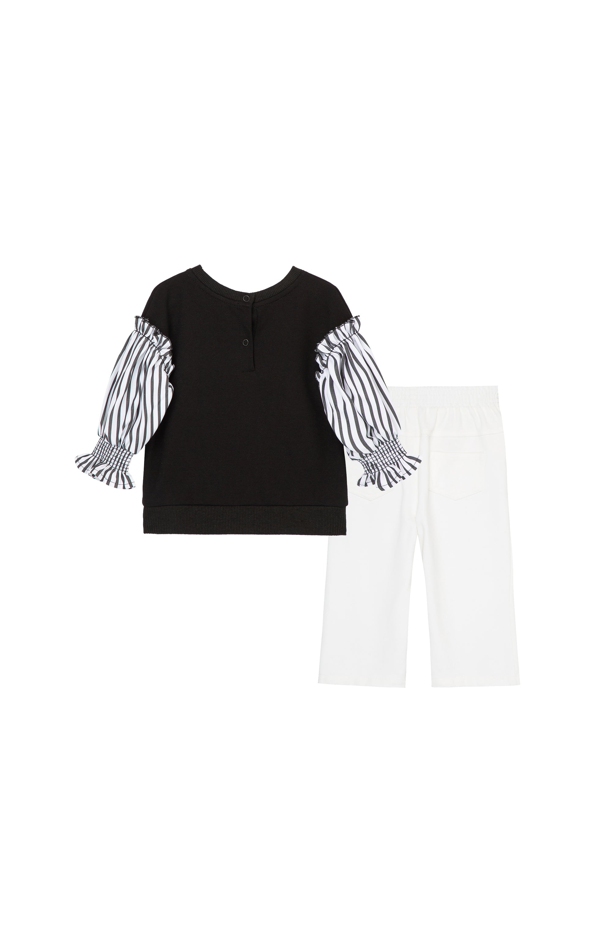 BACK OF BLACK KNIT TOP WITH WOVEN BLACK-AND-WHITE STRIPED SLEEVES, PAIRED WITH A KNIT PULL-ON PANT THAT LOOKS LIKE A JEAN