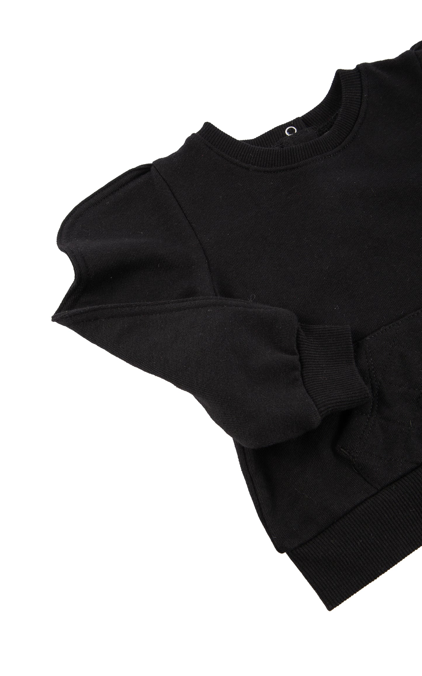 CLOSE UP OF BLACK FRENCH TERRY TOP WITH WAVY SLEEVES