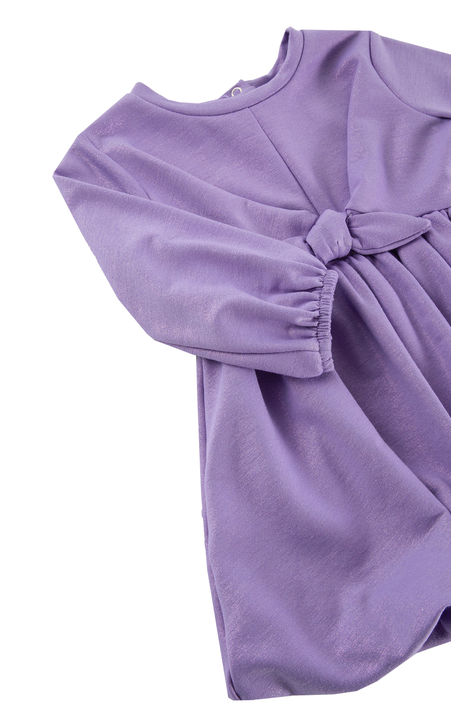 CLOSE UP OF METALLIC PURPLE BUBBLE DRESS WITH BOW